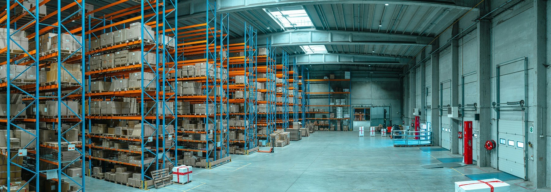Connected warehouse automation routing products between work areas